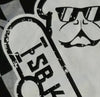 Closeup zoomed in heather grey short sleeve crew neck T-shirt with white bulldog holding white skateboard with SBK9 block lettering on black and grey checkered flag background